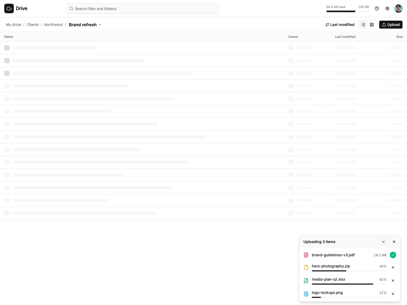 Shadcn Application Shell 47 - Cloud storage shell with an upload tray